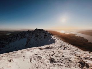 Mid-day sun over Loch Lomond from Ben Lomond